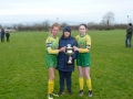 Kathleen Broderick presents cup to Ruby and Emma