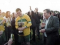 We've Got The Cup: Ballingarry AFC's captain Niall Condron accepting the Desmond League Premier Division trophy from League chairman Michael Hanley following Ballingarry's 1-0 defeat of Rathkeale in the title play-off at Clounreask, Askeaton on 23rd May 2004.