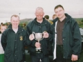 Balllingarry AFC's under 10 team managers proudly display the Division 1 trophy following their league success. From the left: John Clancy, Gerard Murphy, Conor O'Donoghue.