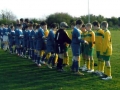 The opposing teams shake hands before kick-off.